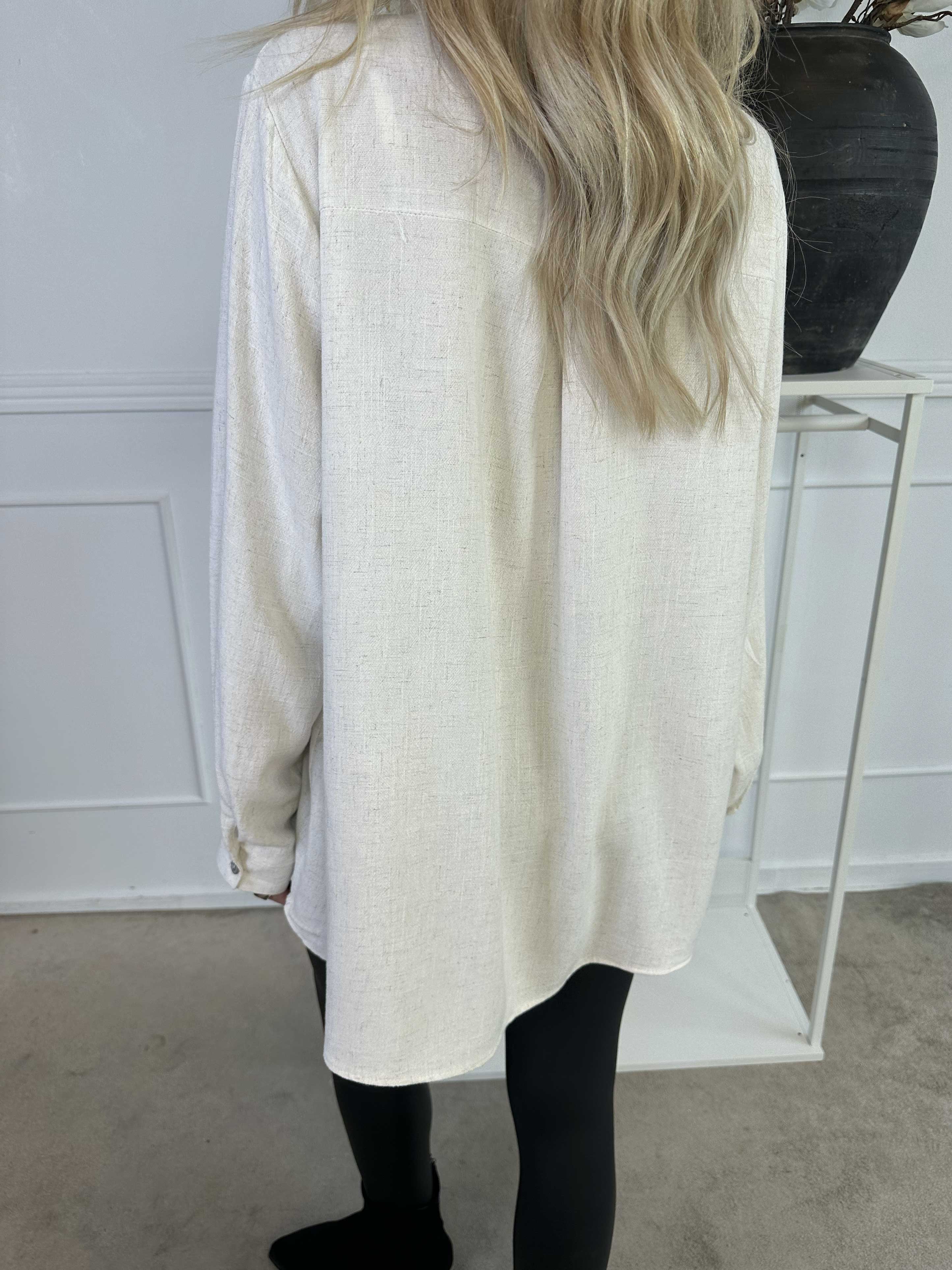 Benna - Ensfarvet tunika lavet i blød viskose